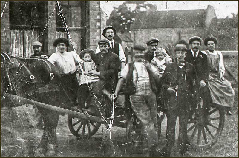 Isaac Taylor and family on dray outside the Chequers
