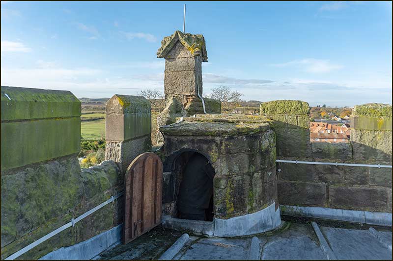 small door at the top of the tower