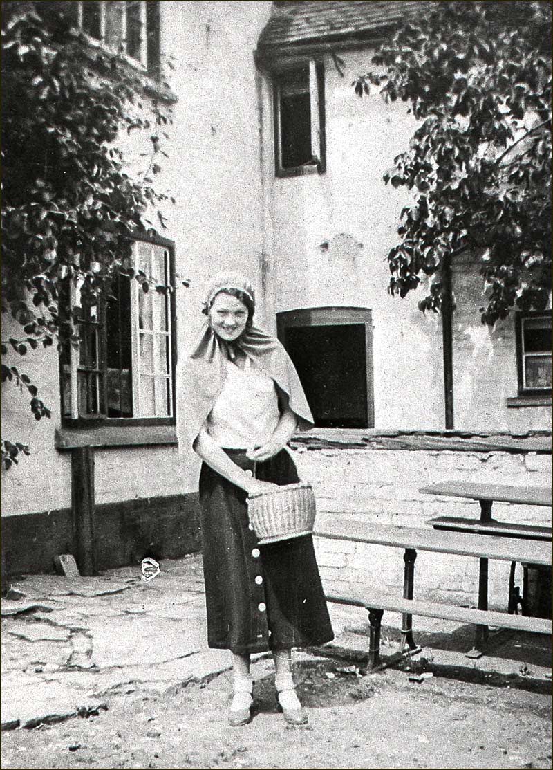 Lady in backyard of Wheatsheaf