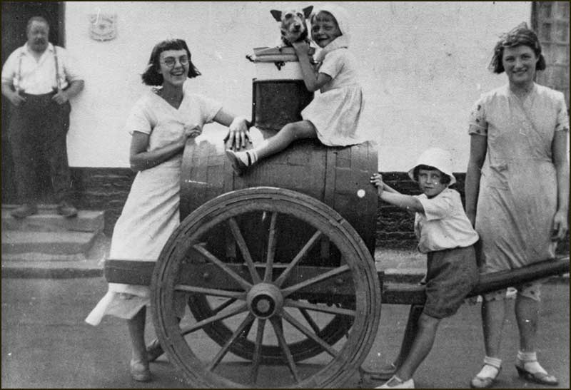 Water cart outside Wheatsheaf
